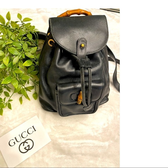 Gucci Handbags - GUCCI Vintage Black Leather Bamboo Drawstring Mini Backpack Purse